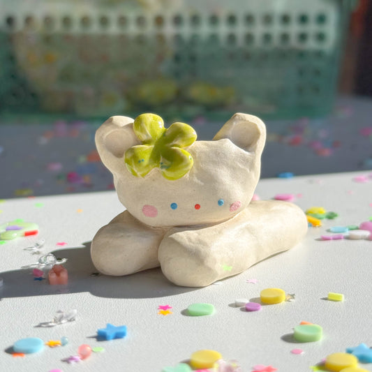 laying down (in the clover field) | ceramic figure